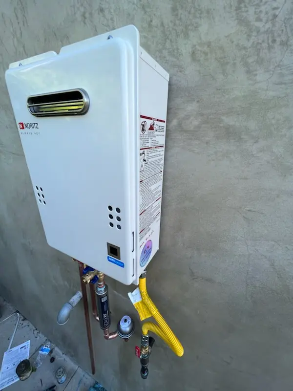 Tankless water heater installation for Green Lantern Village homes